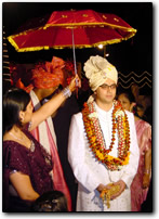 Groom in wedding finery