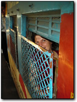 Anne in Bombay commuter train